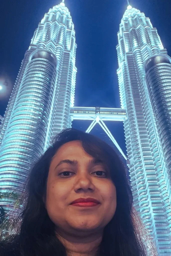 bangladeshi actress robena reza jui in front of malaysia petronas twin tower